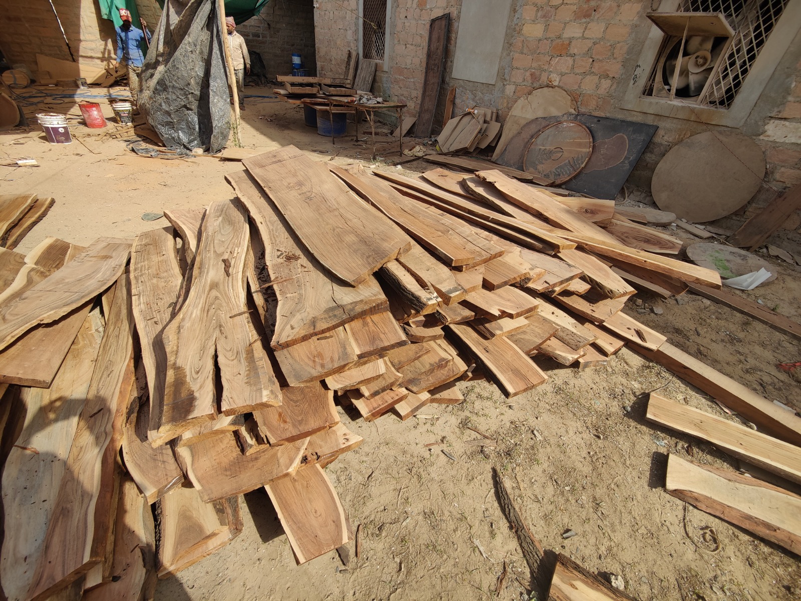 Artisan crafting solid wood furniture at Sansara Living workshop in Jodhpur